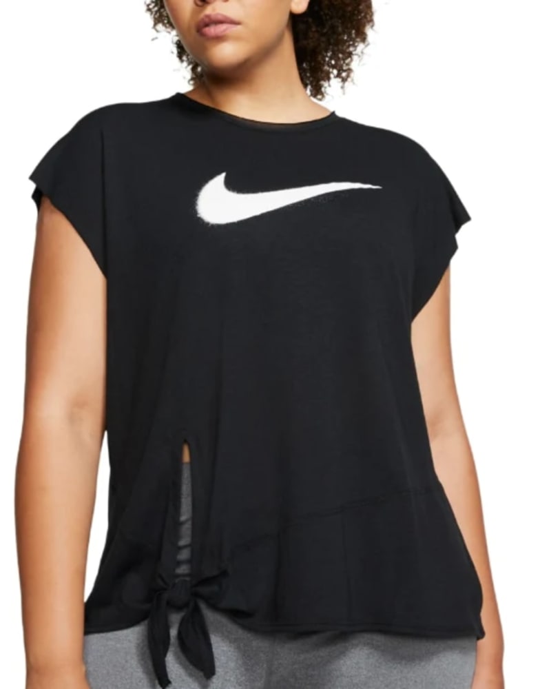 Front of a model wearing a size 1X Nike Women's Plus Size Dry Side-Tie Training Top Black Size 1X in Black by Nike. | dia_product_style_image_id:311426